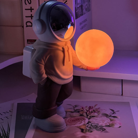 Holding the romantic moon (beige top + brown pants) Creative Astronaut Bluetooth Speaker with 3D Starry Sky Lighting, Portable Wireless Moon Lamp Speaker - Perfect Gift for Space Enthusiasts